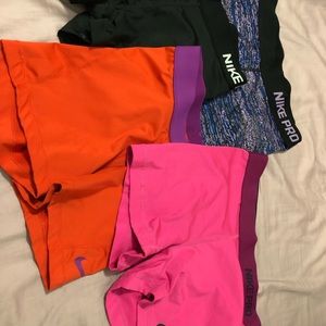 4 Nike Pro women’s shorts, sz medium!
